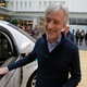 Waymo CEO John Krafcik prepares to step inside a driverless car during a Google event. Photo: AP